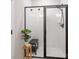 Modern shower with glass enclosure and built-in seat at 5066 Summer Surprise Ln, Charlotte, NC 28215