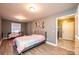 Basement bedroom with a bed and access to exterior at 5241 Whitewater Dr, Hickory, NC 28601