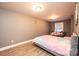 Basement bedroom with a bed and window at 5241 Whitewater Dr, Hickory, NC 28601