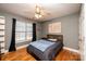 Bedroom with a bed, window, and hardwood floors at 5241 Whitewater Dr, Hickory, NC 28601