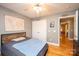 Bedroom with a bed, world map, and hardwood floors at 5241 Whitewater Dr, Hickory, NC 28601