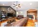 Open living room with vaulted ceiling, hardwood floors, and a view of the kitchen at 5241 Whitewater Dr, Hickory, NC 28601