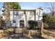 Landscaped backyard with patio and wooden planters at 5811 Rocky Mount Ct, Charlotte, NC 28214