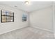 Spacious bedroom with carpet and dual windows at 5811 Rocky Mount Ct, Charlotte, NC 28214