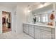 Double vanity bathroom with a large mirror and marble flooring at 6141 Russo Ct, Lancaster, SC 29720