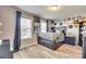 Bright bedroom featuring a comfortable bed and built-in shelving at 6141 Russo Ct, Lancaster, SC 29720