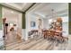 Bright dining room with hardwood floors and a view into the living room at 6141 Russo Ct, Lancaster, SC 29720