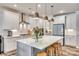 Modern kitchen with white cabinets, quartz countertops, and a large island at 6141 Russo Ct, Lancaster, SC 29720