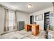 Home office with built-in shelving and a large desk at 6141 Russo Ct, Lancaster, SC 29720