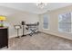 Bright bedroom with neutral walls and ample natural light at 616 N Oak Dr, Huntersville, NC 28078