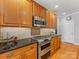 Kitchen with stainless steel appliances and granite countertops at 616 N Oak Dr, Huntersville, NC 28078