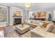 Spacious living room features a fireplace and an open floor plan at 616 N Oak Dr, Huntersville, NC 28078