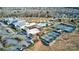 Aerial view of a community center featuring a pool, tennis courts, and parking at 6248 Raven Rock Dr, Denver, NC 28037