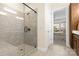 Spa-like bathroom with a walk-in shower and a built-in bench at 6248 Raven Rock Dr, Denver, NC 28037