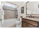 Clean bathroom with tub, shower, and modern vanity at 6248 Raven Rock Dr, Denver, NC 28037