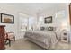 Bright bedroom with king-size bed and large windows at 6248 Raven Rock Dr, Denver, NC 28037