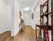 Light and airy entryway with hardwood floors and coat rack at 6248 Raven Rock Dr, Denver, NC 28037