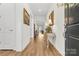 Bright and spacious entryway with hardwood floors and elegant console table at 6248 Raven Rock Dr, Denver, NC 28037