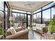 Relaxing sunroom with wicker furniture and plenty of natural light at 6248 Raven Rock Dr, Denver, NC 28037