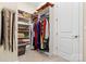 Spacious walk-in closet with ample shelving and hanging space at 6248 Raven Rock Dr, Denver, NC 28037