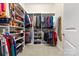 Large walk-in closet featuring custom shelving and hanging rods at 6248 Raven Rock Dr, Denver, NC 28037