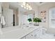 Clean bathroom with white vanity and large mirror at 6328 County Donegal Ct, Charlotte, NC 28277