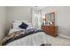 Charming bedroom with a double bed and dresser at 6328 County Donegal Ct, Charlotte, NC 28277