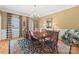 Formal dining room with a large table, chairs, and hardwood floors at 6328 County Donegal Ct, Charlotte, NC 28277