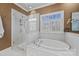 Luxurious bathroom with soaking tub and walk-in shower at 6328 County Donegal Ct, Charlotte, NC 28277