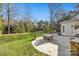 Large stone patio perfect for outdoor dining and entertaining at 6328 County Donegal Ct, Charlotte, NC 28277