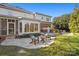 Spacious patio with seating area and outdoor kitchen at 6328 County Donegal Ct, Charlotte, NC 28277