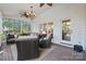 Relaxing sunroom with wicker furniture and brick flooring at 6328 County Donegal Ct, Charlotte, NC 28277