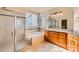 Bathroom with granite countertop, large shower, and soaking tub at 6926 Linkside Ct, Charlotte, NC 28277