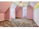 Charming bedroom with pink walls and brown carpet at 6926 Linkside Ct, Charlotte, NC 28277