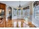 Breakfast nook with hardwood floors and large windows at 6926 Linkside Ct, Charlotte, NC 28277