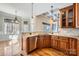 Kitchen features granite countertops, stainless steel appliances, and wood cabinets at 6926 Linkside Ct, Charlotte, NC 28277