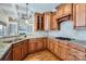 Spacious kitchen with granite countertops, wood cabinets, and stainless steel appliances at 6926 Linkside Ct, Charlotte, NC 28277