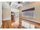 Spacious living room with hardwood floors and large windows at 6926 Linkside Ct, Charlotte, NC 28277