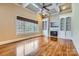 Living room features hardwood floors, a fireplace, and built-in shelving at 6926 Linkside Ct, Charlotte, NC 28277