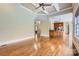 Open living room with hardwood floors and kitchen views at 6926 Linkside Ct, Charlotte, NC 28277