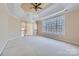 Spacious main bedroom with high ceilings, large window, and carpet at 6926 Linkside Ct, Charlotte, NC 28277