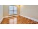 Bright office with hardwood floors and large window at 6926 Linkside Ct, Charlotte, NC 28277