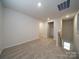 Upstairs hallway with carpeted floors and access to bedrooms at 821 Blue Canyon Dr, York, SC 29745