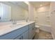 Bathroom with double vanity, gray cabinets, and shower/tub combo at 853 Blue Canyon Dr, York, SC 29745