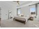 Main bedroom with king bed and large windows at 8788 Potter Rd, Matthews, NC 28104