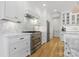 Modern kitchen with stainless steel appliances and marble countertops at 8788 Potter Rd, Matthews, NC 28104