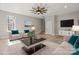 Open living room featuring neutral paint, natural light and modern furnishings at 888 Brevard Place Rd, Iron Station, NC 28080