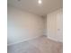 Simple bedroom with neutral walls and carpet flooring at 909 Smithcliffs Trl, York, SC 29745