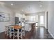 Modern kitchen with white cabinets, granite countertops, and stainless steel appliances at 9115 Bluefield St, Charlotte, NC 28273