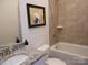 Bathroom with granite countertop and tiled shower/tub at 106 Milliner Dr # 97, Troutman, NC 28166